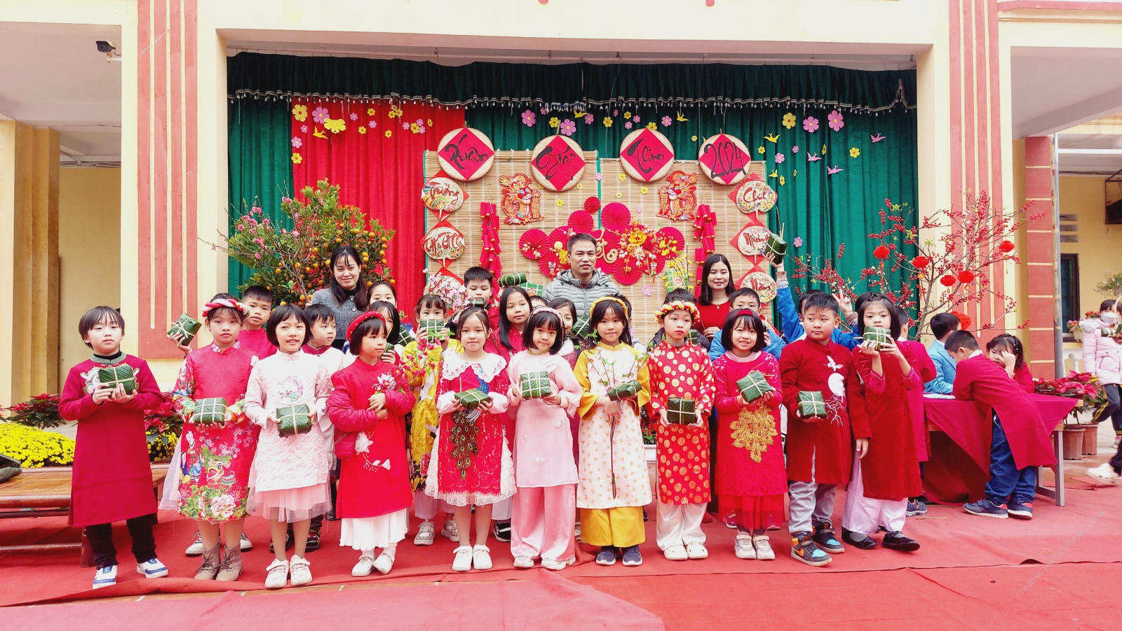 A group of children posing for a photo  Description automatically generated